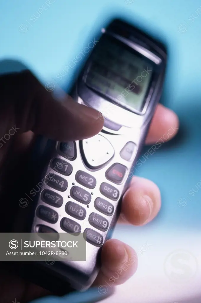 Close-up of a person holding a mobile phone