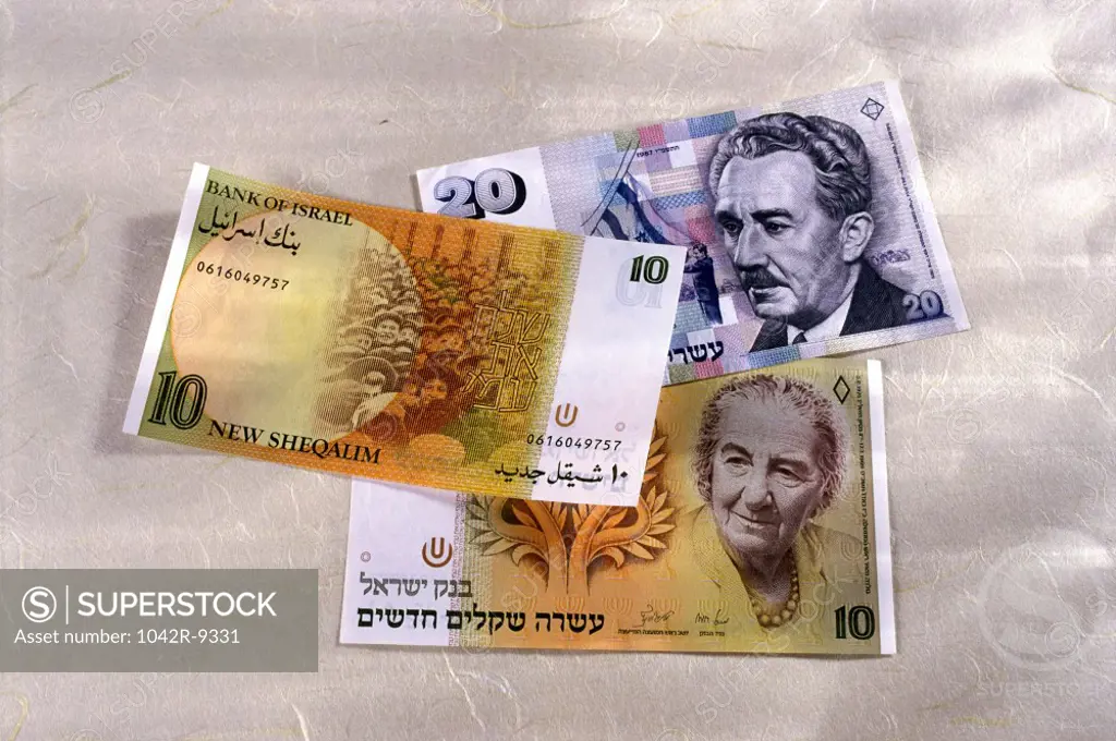 Close-up of Israeli banknotes