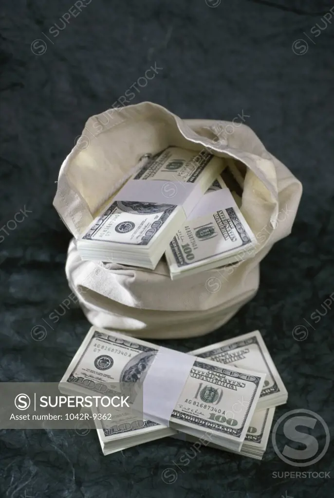 Bag filled with American dollar bills
