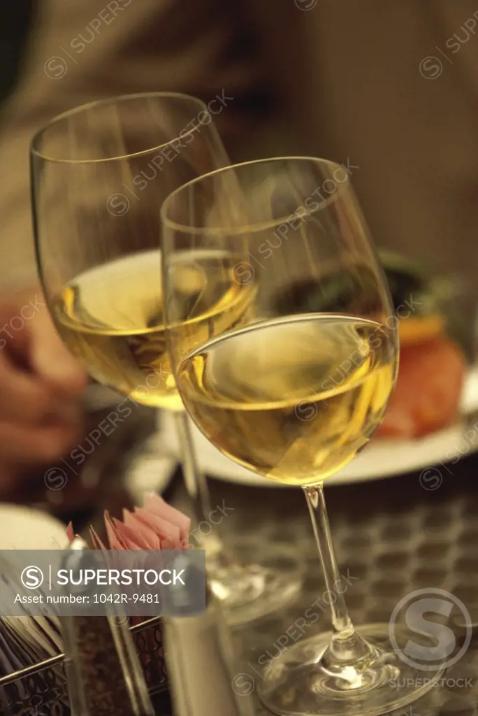 Two wineglasses on a table