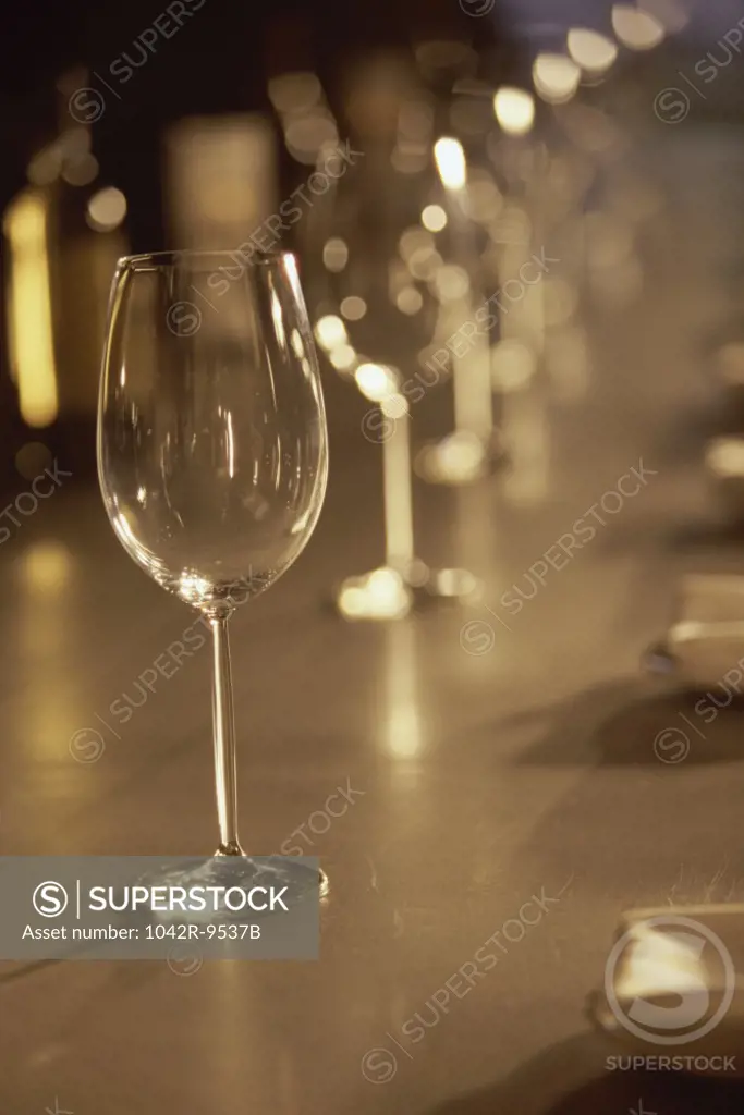 Glasses in a row on a bar