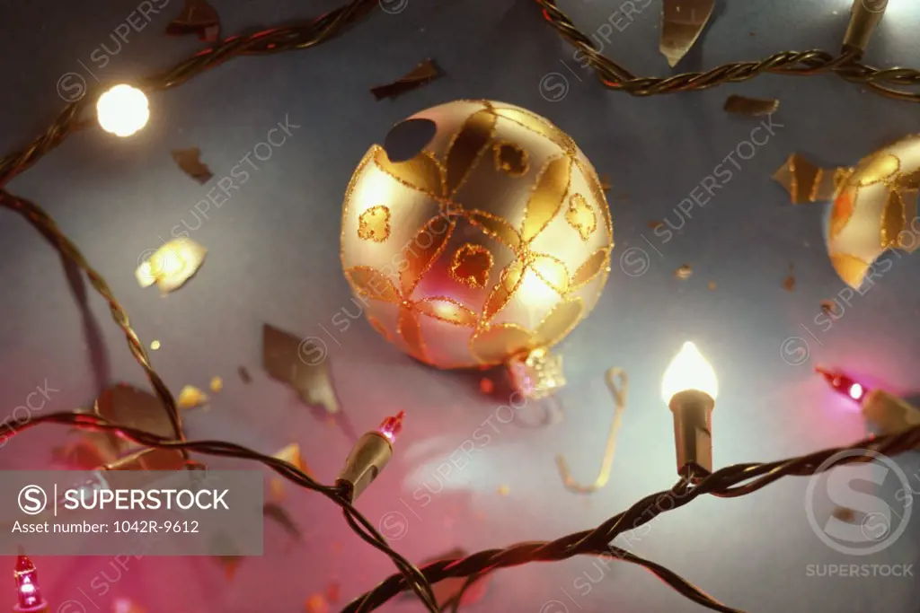 Close-up of a Christmas ornament and Christmas tree lights