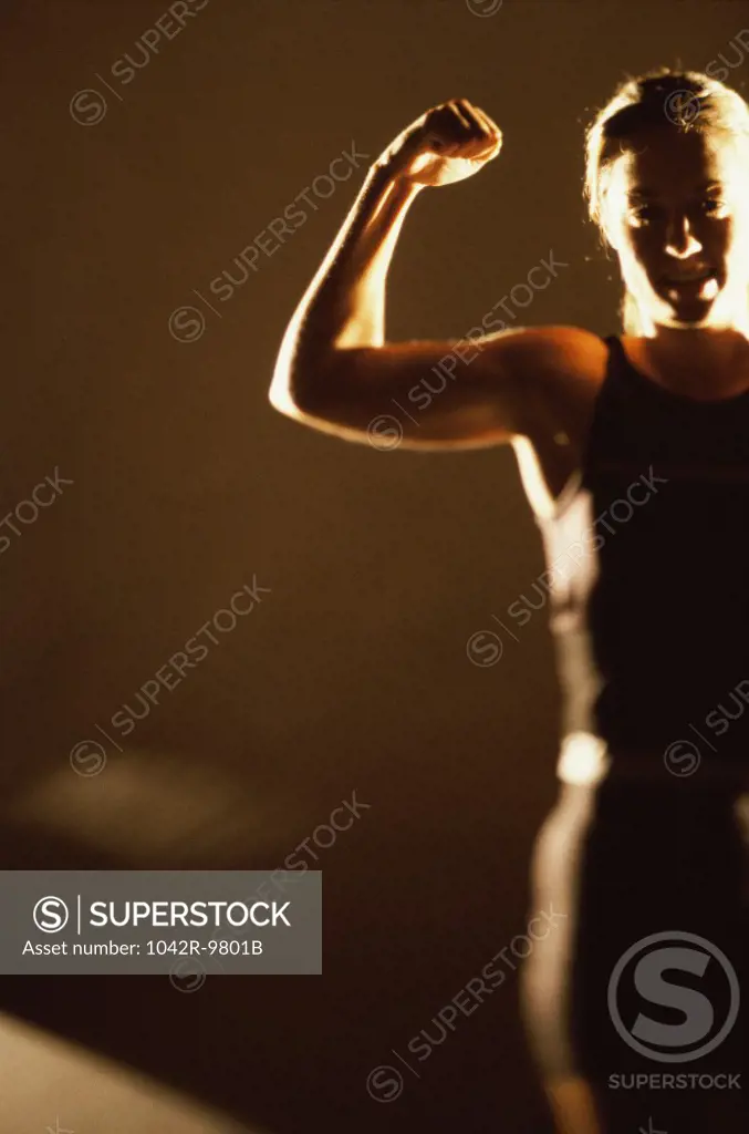 Woman flexing her biceps
