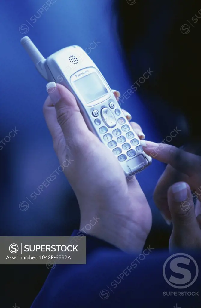 Person holding a mobile phone