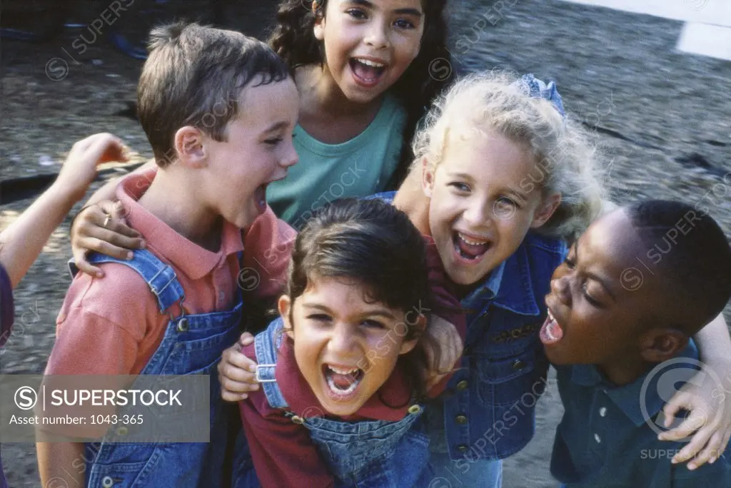High angle view of a group of children laughing