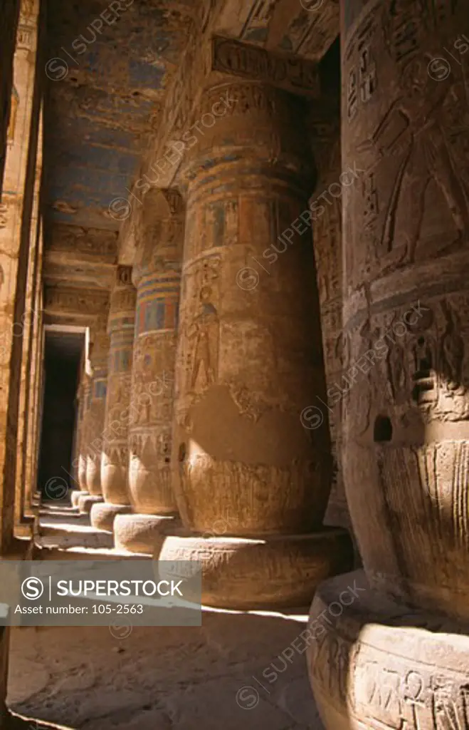 Low angle view of stone pillars, Great Hypostyle Hall, Temple of Horus, Edfu, Egypt