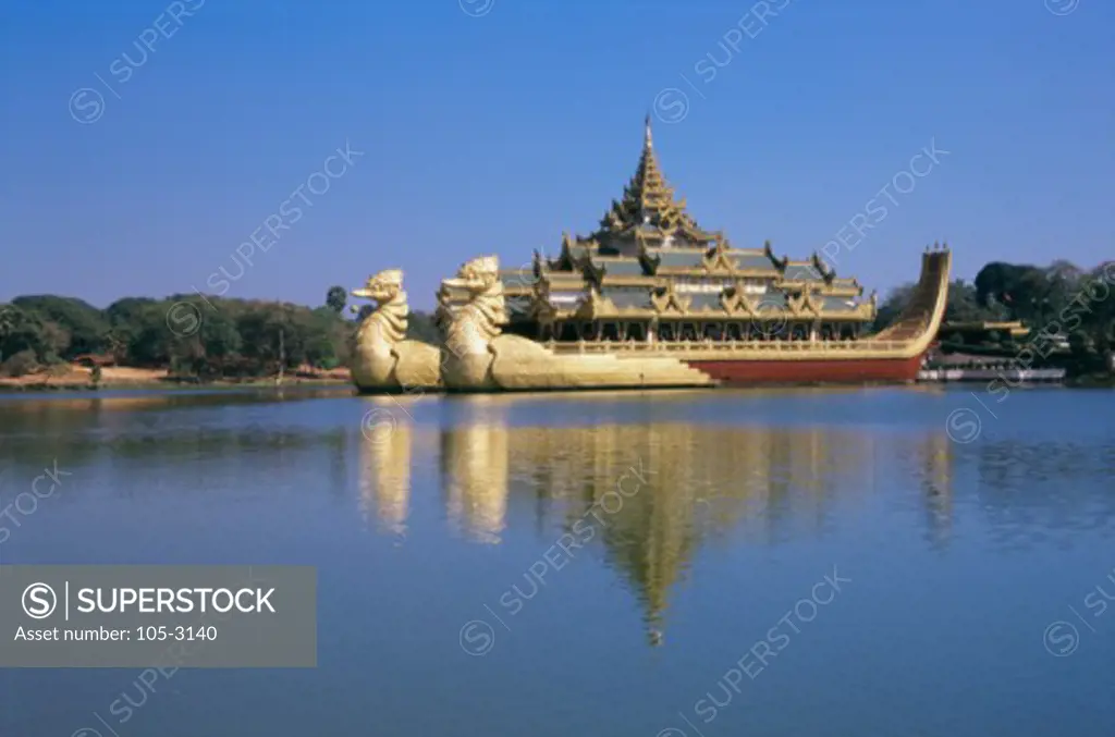 Reflection of a restaurant in a lake, Karaweik Restaurant, Kandawgyi Lake, Yangon, Myanmar