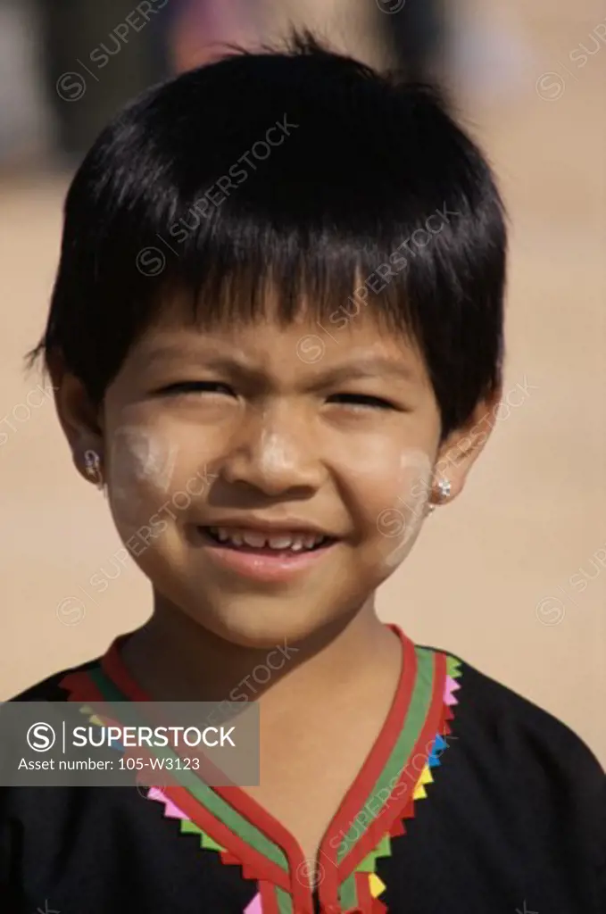 Close-up of a Lahu girl smiling, Myanmar