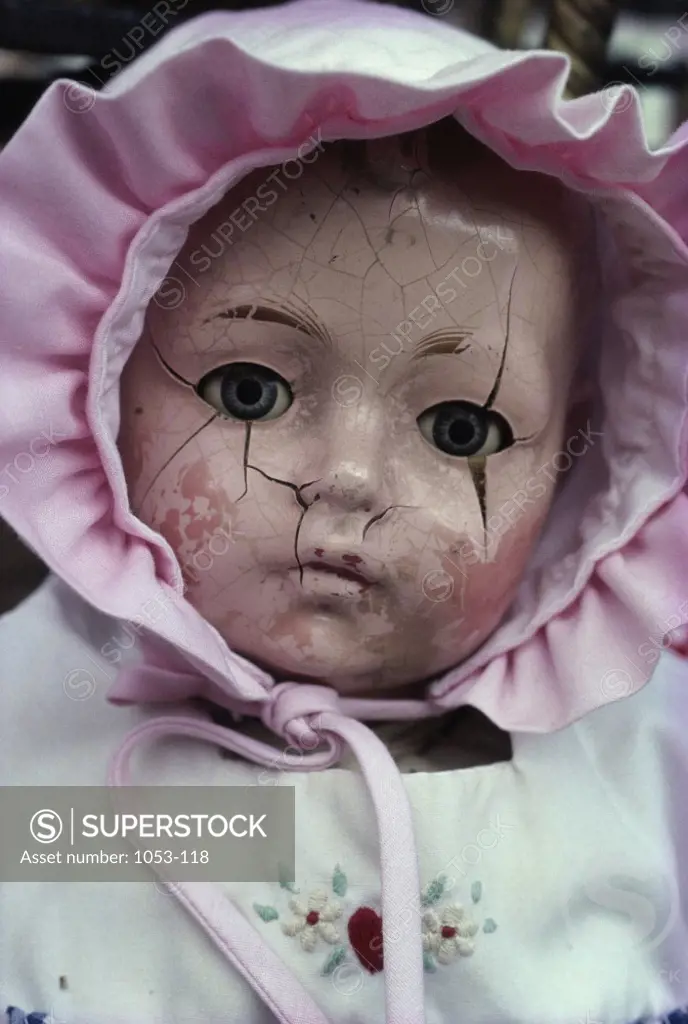 Close-up of a cracked doll