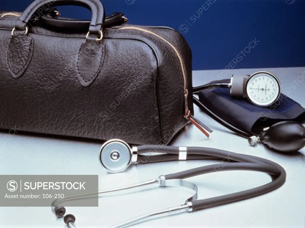 Close-up of a bag with a blood pressure gauge and a stethoscope