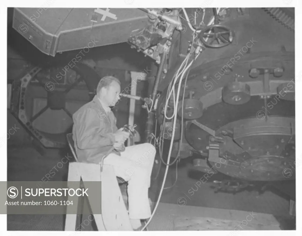 GENE HANCOCK USING THE 60-INCH TELESCOPE ON MT. WILSON.
