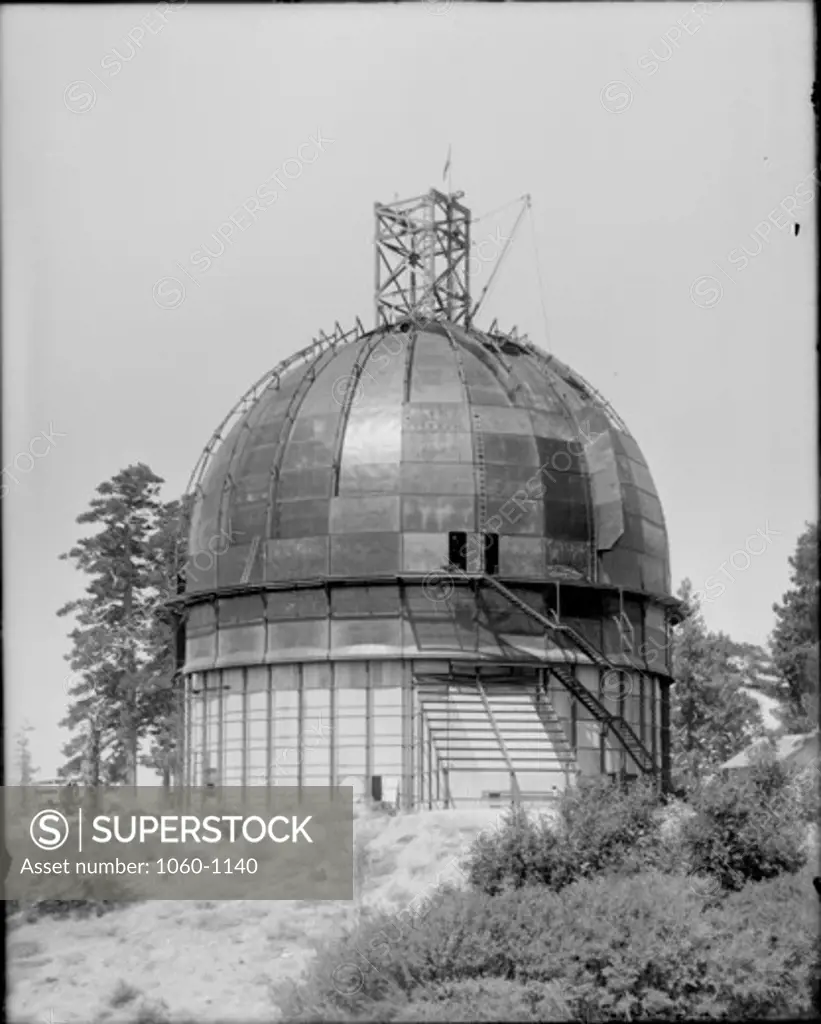 100-INCH TELESCOPE DOME UNDER CONSTRUCTION; PART OF 'FIN' AND MOST OF DOME SHEATHING ON.