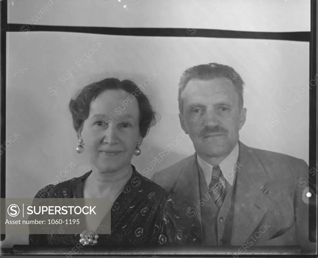 TWO PASSPORT PHOTOS OF GUSTAF & MRS. STROMBERG.