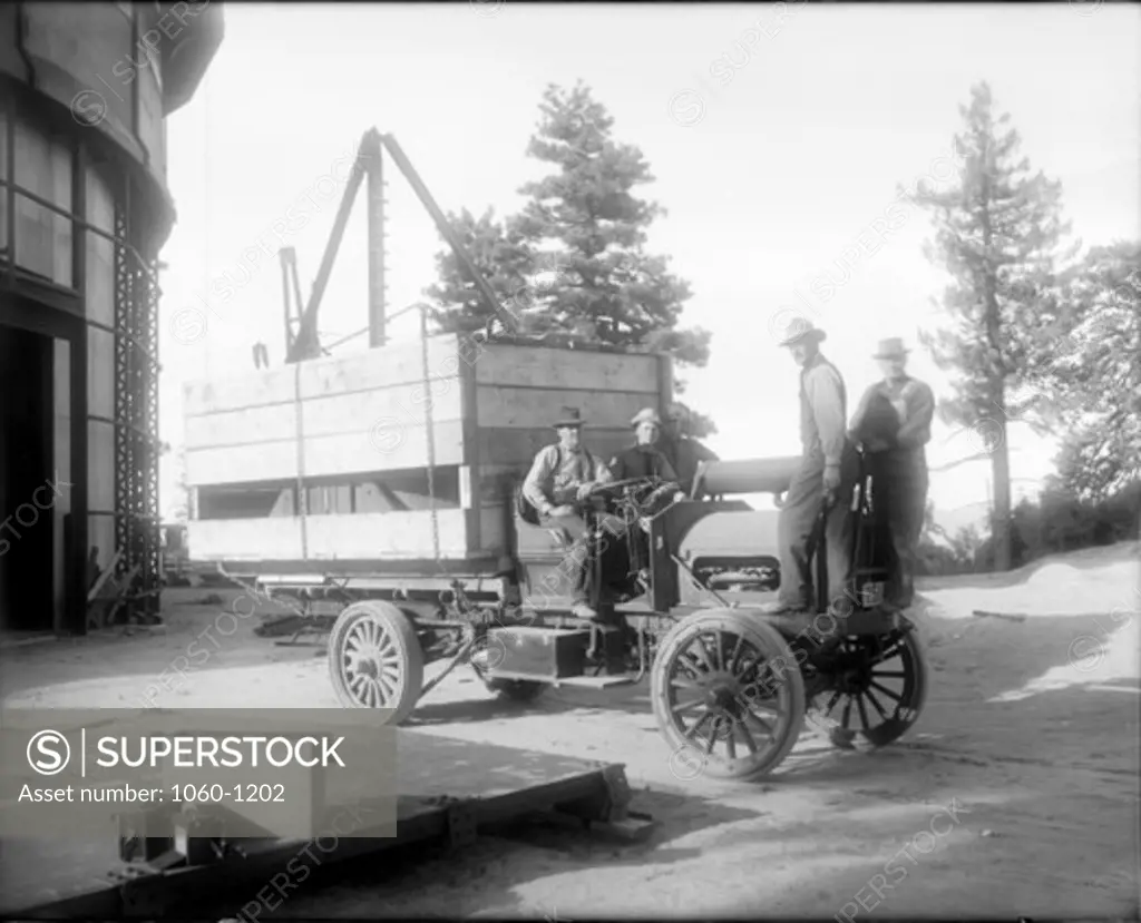 3-TON AUTO TRUCK WITH BIG BOX LOAD AT CONSTRUCTION SITE FOR 100-INCH TELESCOPE ON MT. WILSON (GEORGE JONES STANDING OVER RIGHT FRONT TIRE).