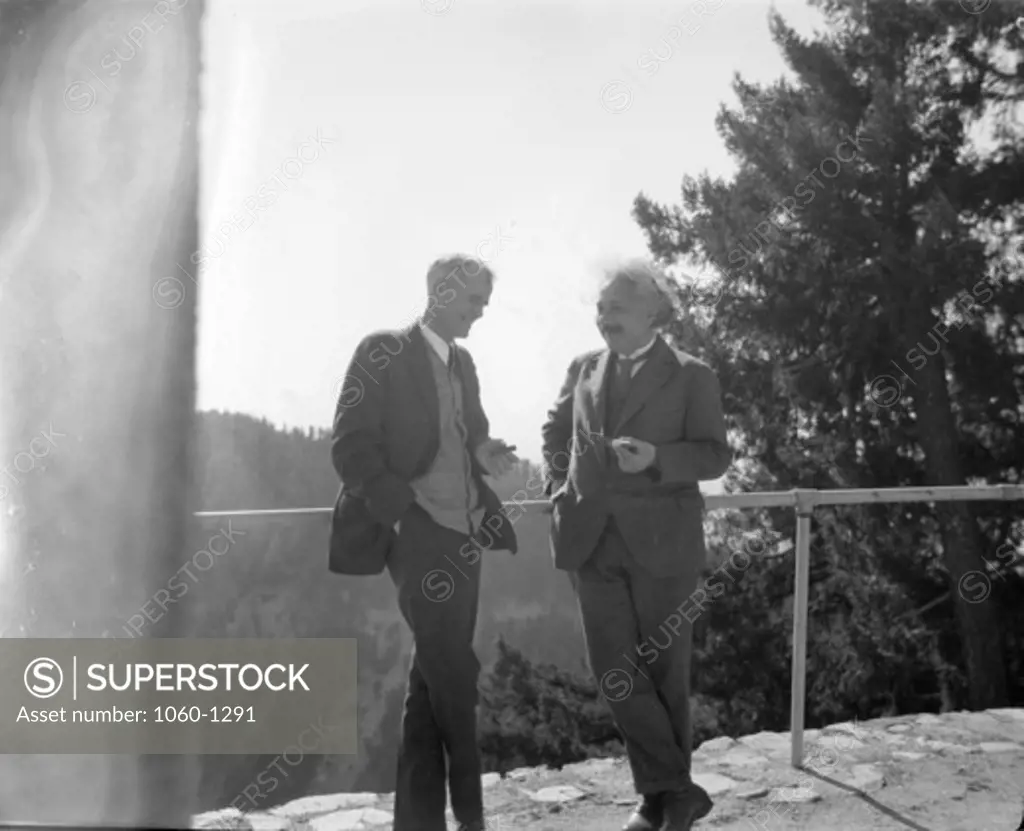 (L TO R): WALTER ADAMS & ALBERT EINSTEIN AT THE RAILING OUTSIDE THE MT. WILSON 'MONASTERY.'