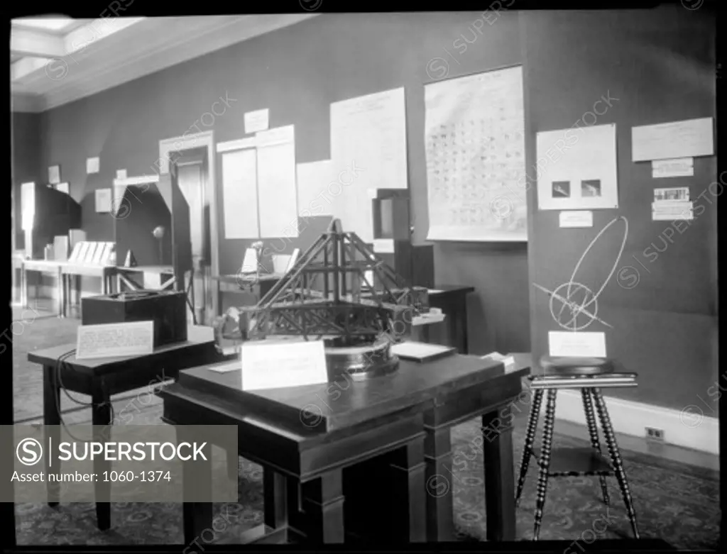 MT. WILSON EXHIBITS ON DISPLAY; MODEL OF ETHER DRIFT EXPERIMENTAL APPARATUS IN FOREGROUND.