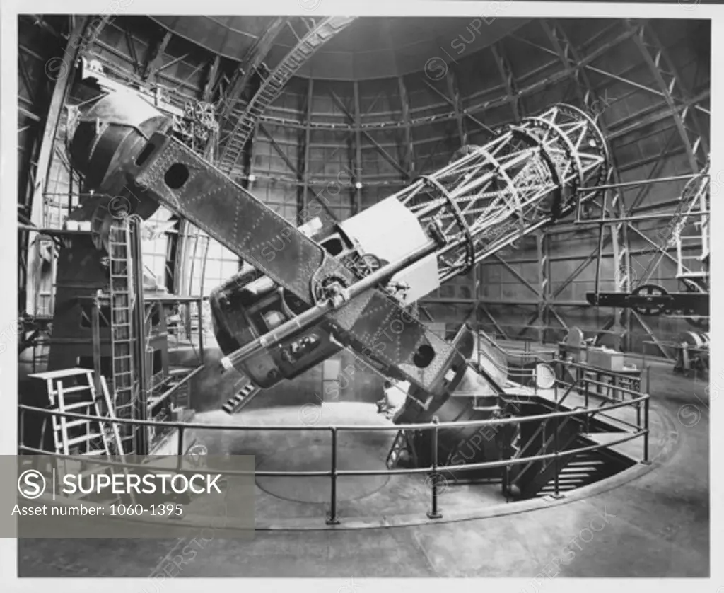 100-INCH TELESCOPE SIDE VIEW WITH TUBE 40 DEGREES FROM HORIZONTAL. Hubble's chair visible at left.