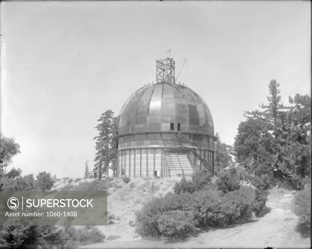 100-INCH TELESCOPE DOME UNDER CONSTRUCTION WITH PART OF 'FIN' & DOME SHEATHING UP, AS SEEN FROM THE SOUTH.