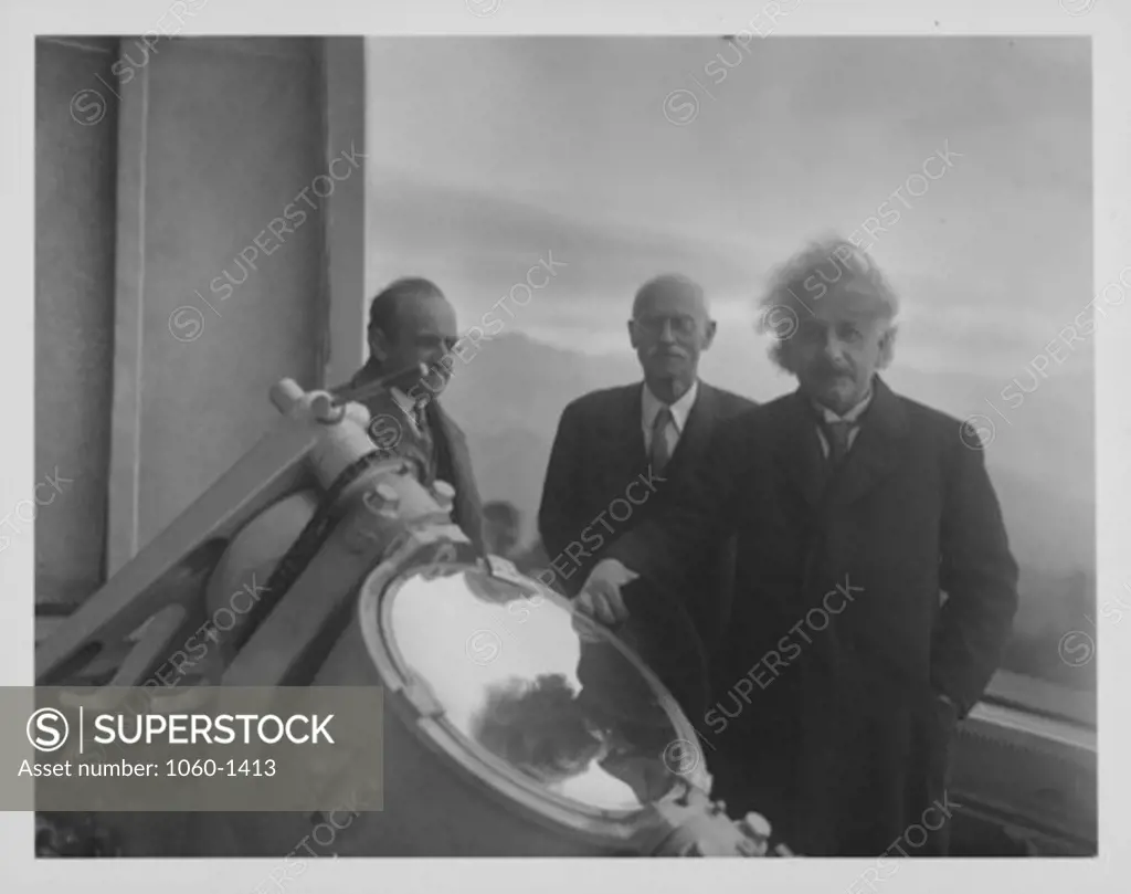 (L TO R): WALTHER MAYER, CHARLES ST. JOHN, & ALBERT EINSTEIN AT THE COELOSTAT AT THE TOP OF THE 150-FOOT TOWER TELESCOPE.