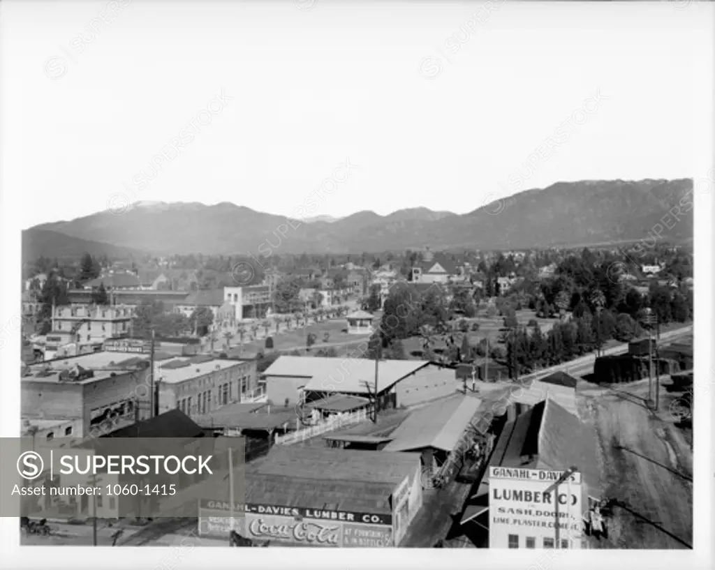 HISTORICAL VIEW OF PASADENA FROM CHAMBER OF COMMERCE:   GANAHL-DAVIES LUMBER CO.; THE IVEY FURNISHED ROOMS; PARK CYCLE CO.; UNION FEED & FUEL CO.