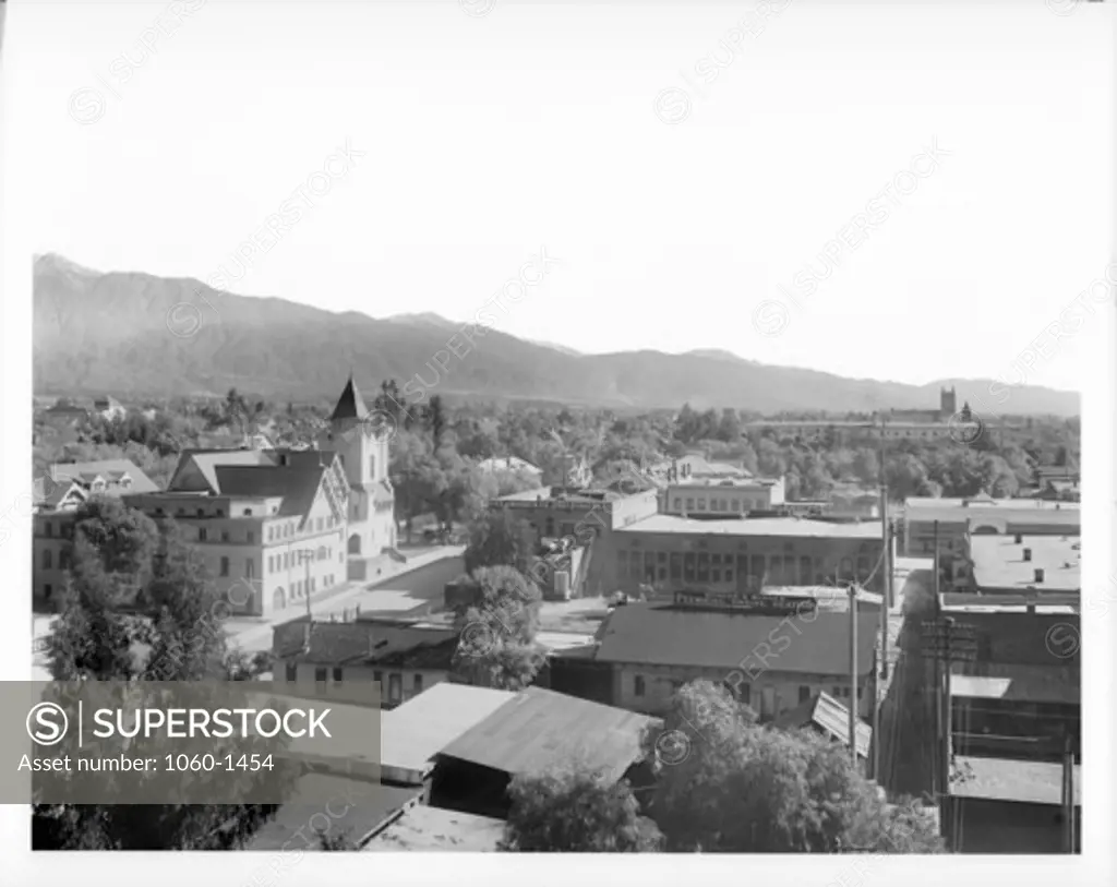 HISTORICAL VIEW OF PASADENA LOOKING EAST-NORTHEAST FROM CHAMBER OF COMMERCE: MUNGER & MUNGER PLUMBING; IVES & WARREN CO., UNDERTAKERS