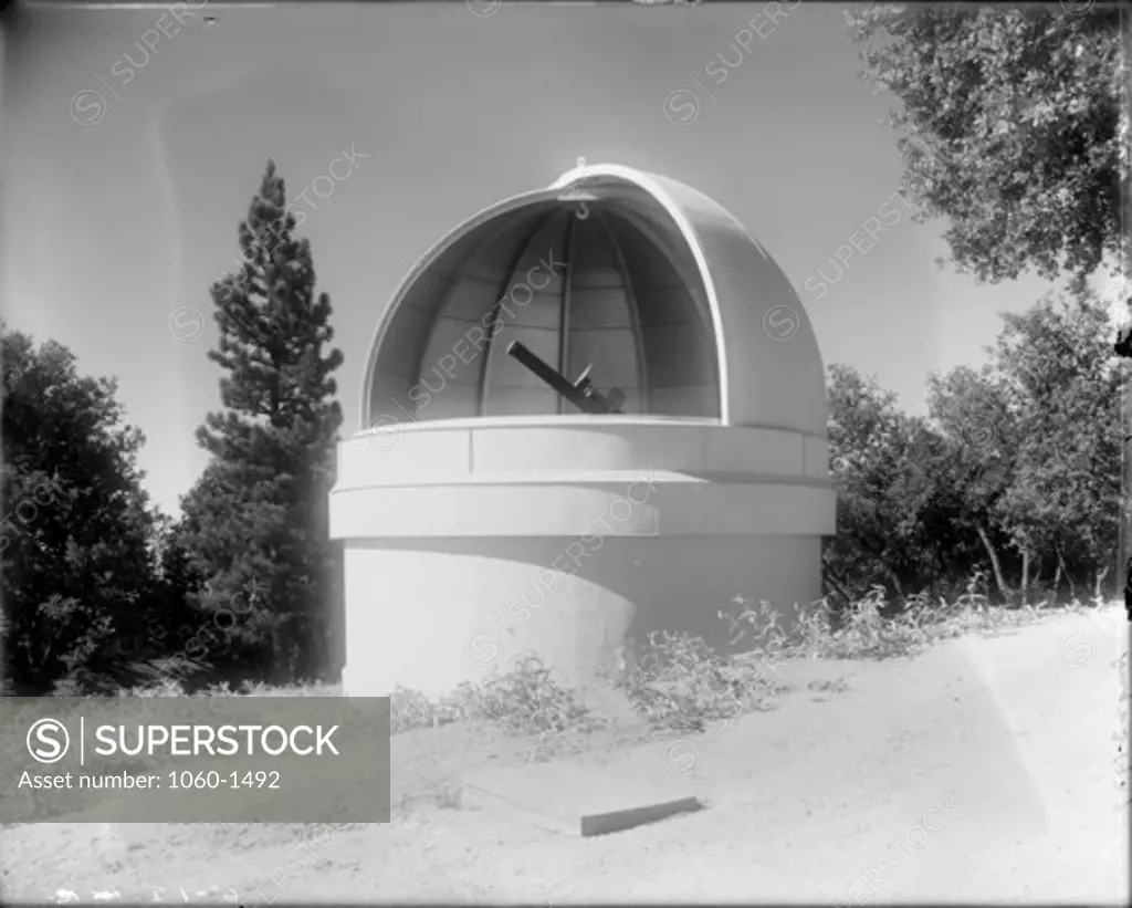 6-INCH TELESCOPE PARTIALLY VISIBLE INSIDE OPEN DOME, AS SEEN FROM THE NORTHEAST.
