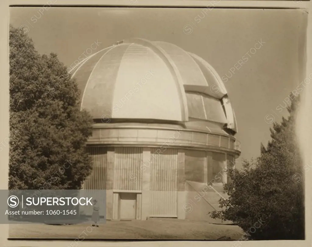 60-inch telescope dome with woman standing in front