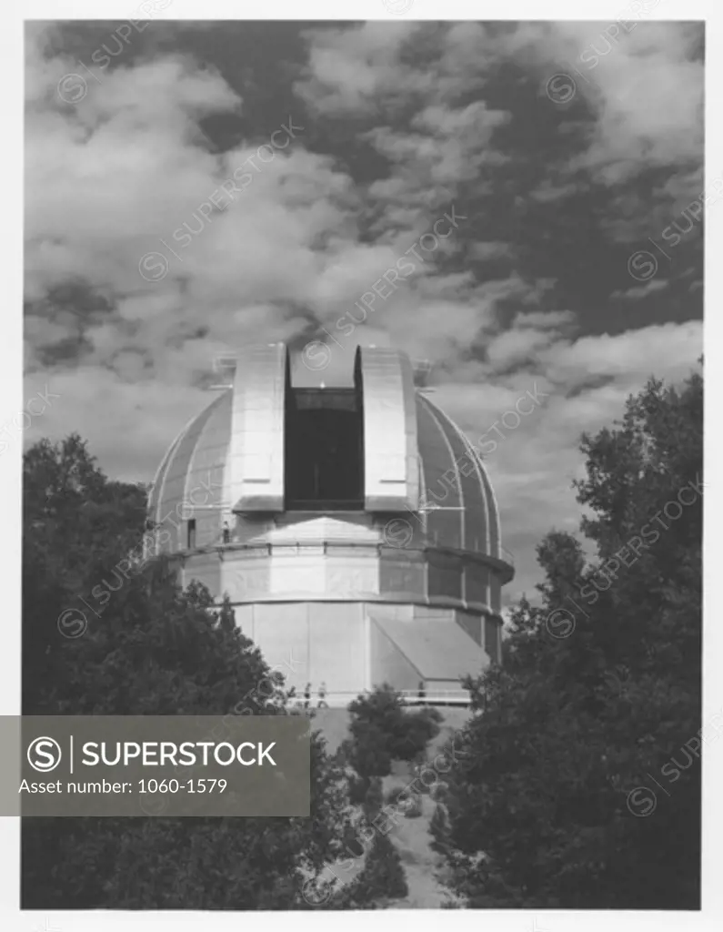 100-INCH TELESCOPE DOME AS SEEN FROM THE SOUTHWEST, SHUTTERS OPEN, MAN VISIBLE ON CATWALK.