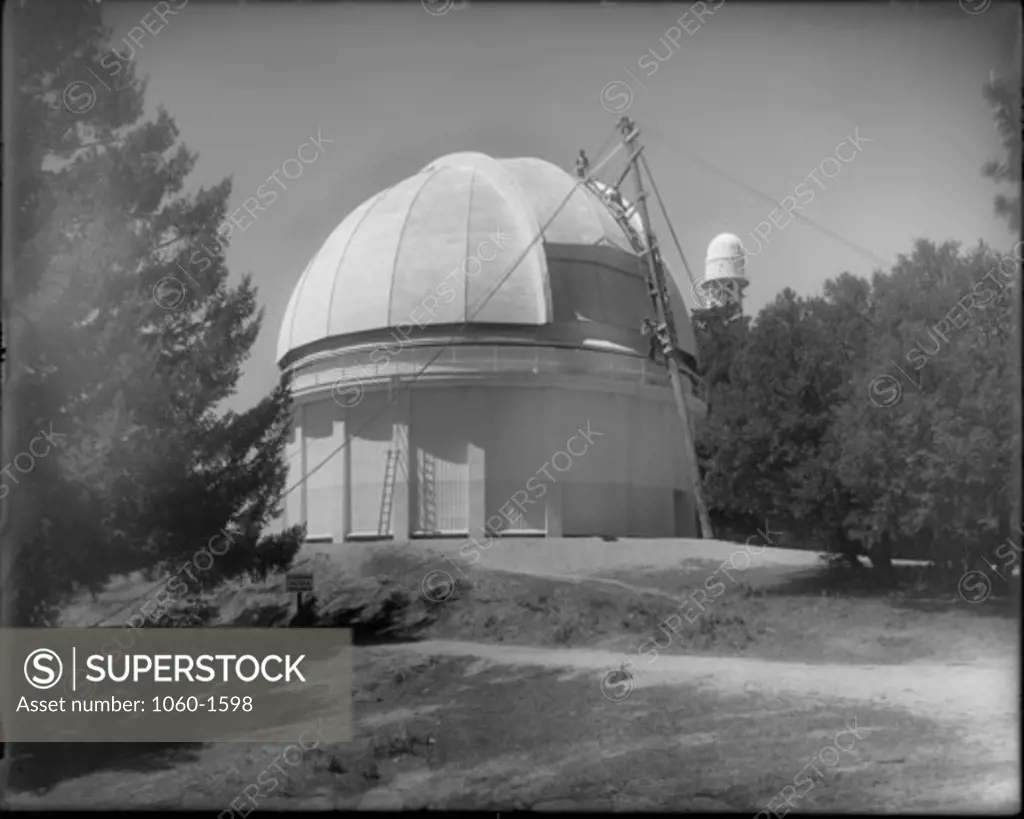 PAINTING THE 60-INCH TELESCOPE DOME.