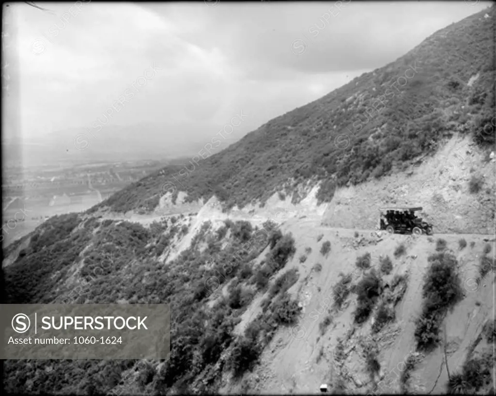 MT. WILSON AUTO STAGE LINE/MAIL TRUCK TRAVELING ON TOLL ROAD.