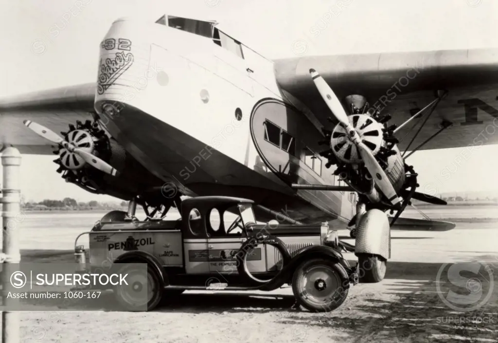 Oil Truck parked near an airplane, Fokker F32, 1930