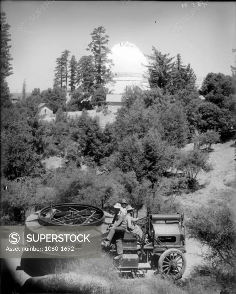 OBSERVATORY 3-TON TRUCK ON MT. WILSON CARRYING 100-INCH MIRROR CELL; PHOTO TAKEN BELOW 150-FOOT TOWER TELESCOPE; 100-INCH TELESCOPE DOME VISIBLE IN BACKGROUND.