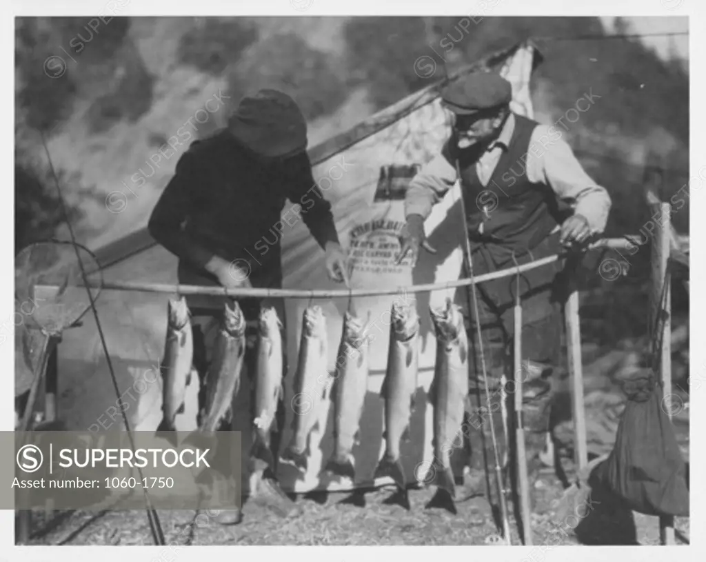 FERDINAND ELLERMAN AFTER A SUCCESSFUL FISHING TRIP.