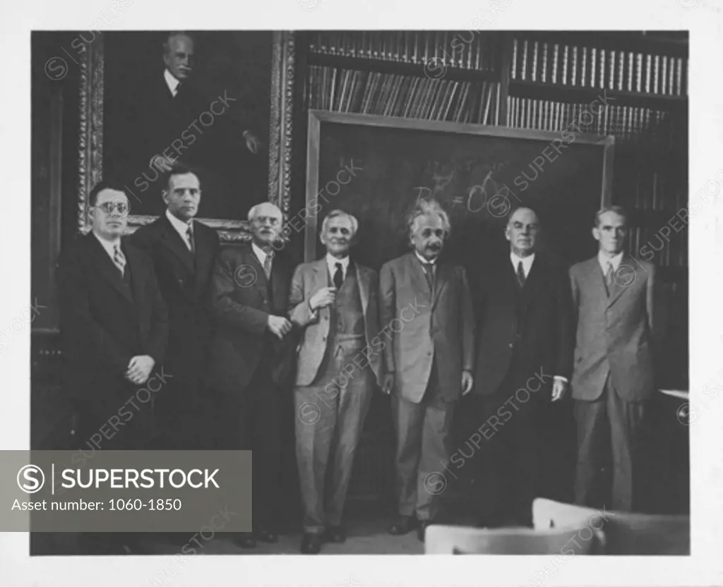 (L TO R): Milton Humason, Edwin Hubble, Charles St. John, Albert Michelson, Albert Einstein, William Campbell, and Walter S. Adams after a seminar in the Observatory's Hale Library, Santa Barbara Street offices, Pasadena.