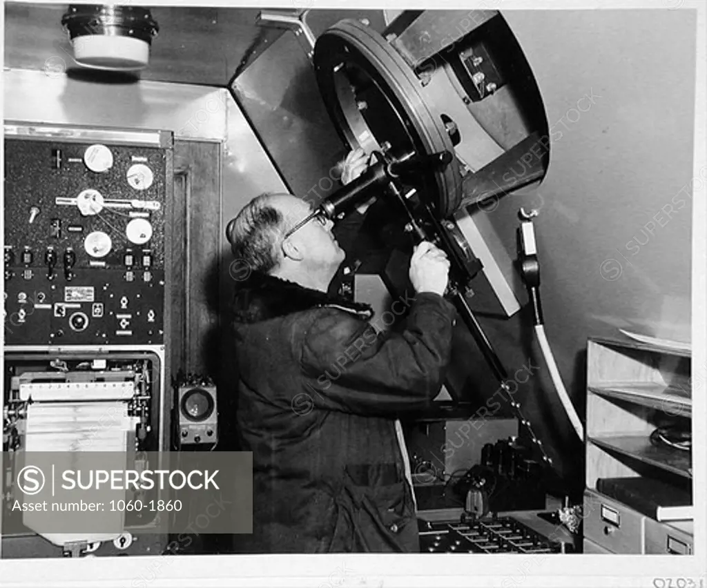WILLIAM MILLER AT THE 200-INCH TELESCOPE COUDE EYEPIECE.