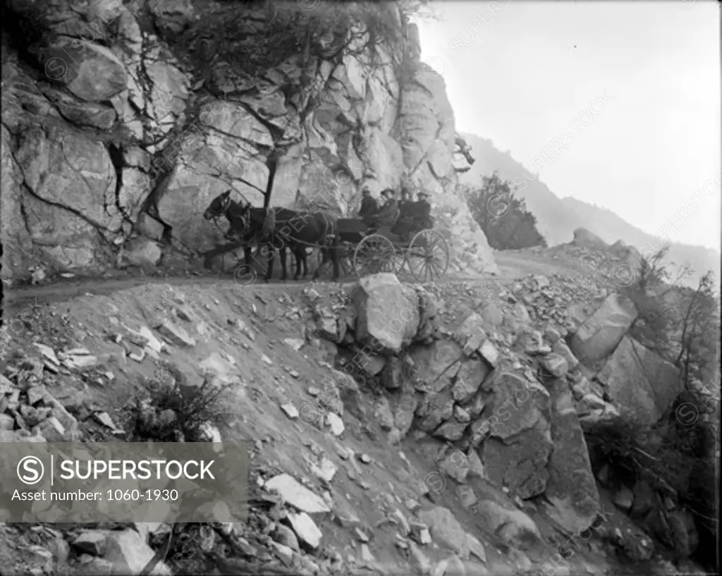 WAGON ON MT. WILSON TOLL ROAD, ABOVE MARTIN'S CAMP WATER TUNNEL, CARRYING (L TO R): DRIVER, GEORGE HALE, , & JOHN HOOKER.