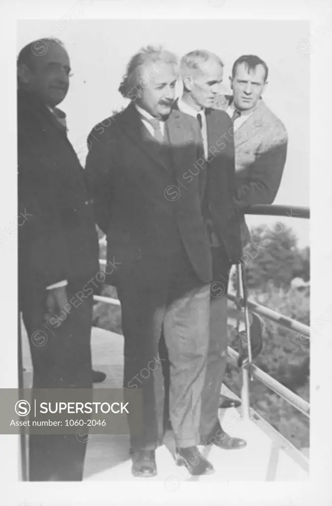 (L TO R): WALTHER MAYER, ALBERT EINSTEIN, WALTER ADAMS, & EDWIN HUBBLE ON THE CATWALK OF THE 100-INCH TELESCOPE DOME.