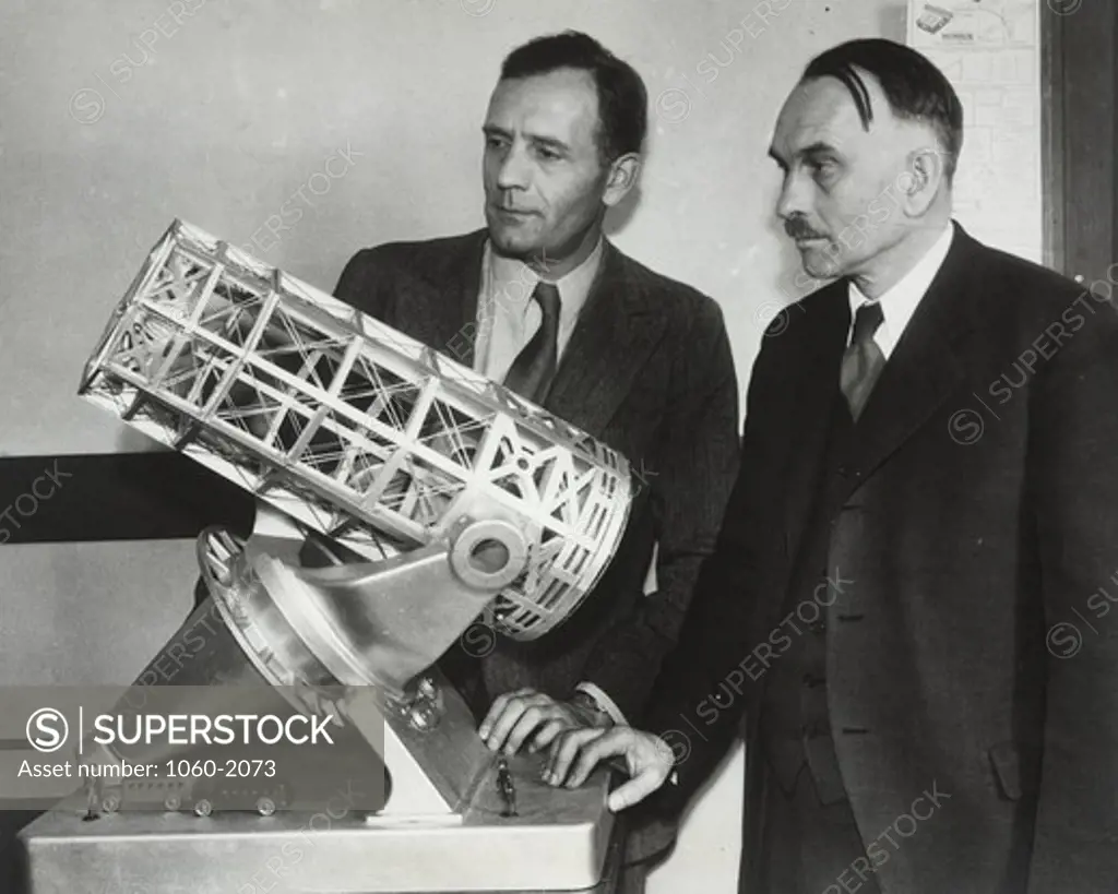 Edwin Powell Hubble and Richard Chace Tolman, with model of proposed 200-inch telescope for California