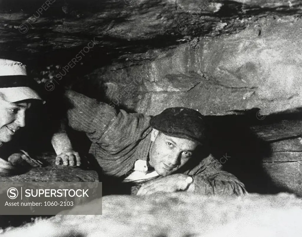 Edwin Powell Hubble (right) and Jack Roberts in cave