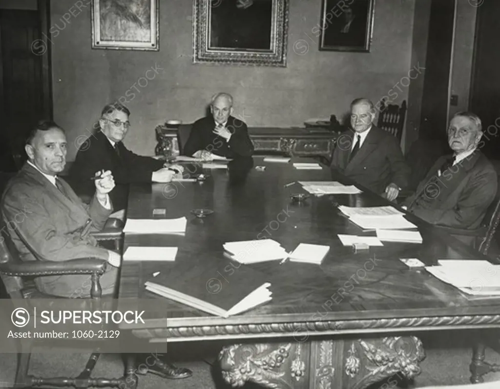 Trustees of Henry E Huntington Library and Art Gallery, sitting at table, from left to right: Edwin Powell Hubble, William Bennett Munro, Robert Andrews Millikan, Herbert Clark Hoover, and Allan Christopher Balch