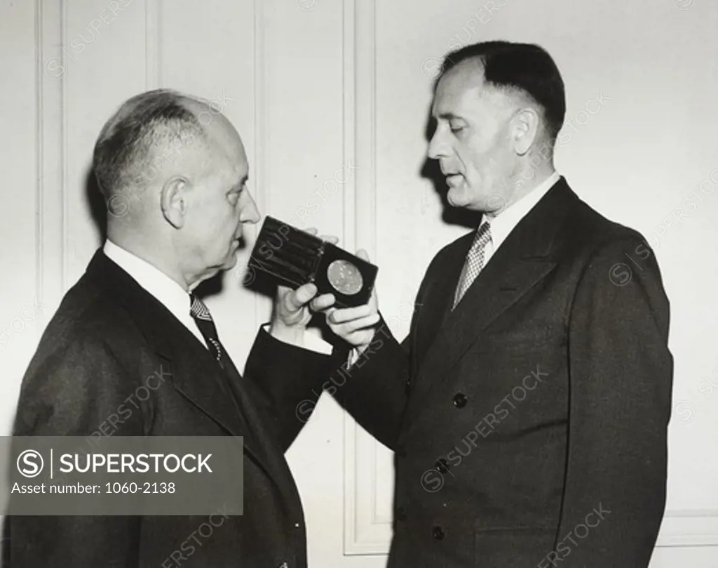 Edwin Powell Hubble receiving Franklin Medal of Franklin Institute from Philip Clayton Staples