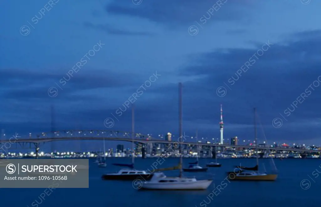 Sailboats in a harbor with a bridge in the background, Auckland Harbour Bridge, Auckland, New Zealand
