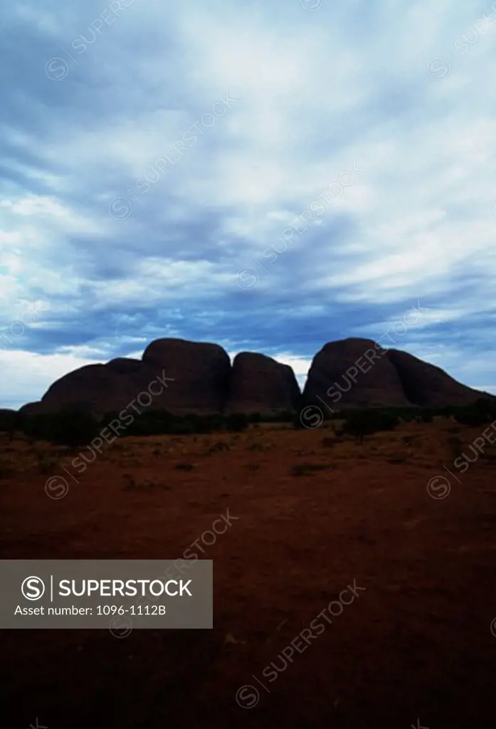 Rock formations on a landscape, Olgas, Uluru-Kata Tjuta National Park, Northern Territory, Australia