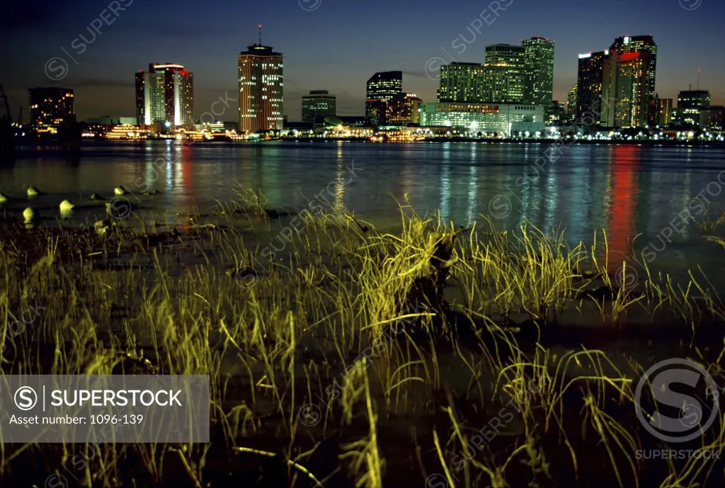 Buildings lit up at night, New Orleans, Louisiana, USA