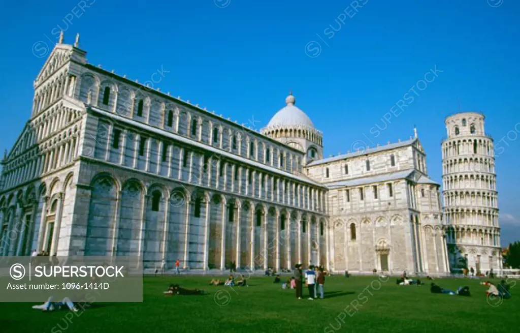 Low angle view of a cathedral near a tower, Duomo, Leaning Tower, Pisa, Italy
