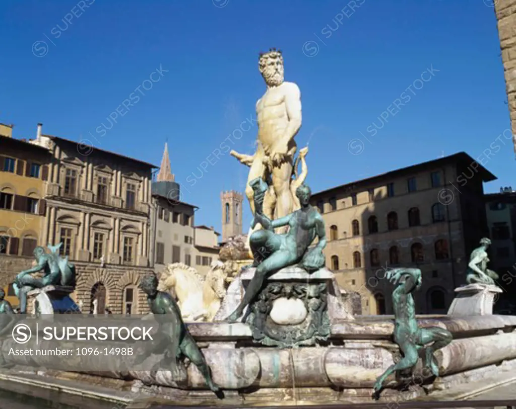 Low angle view of a fountain, Fountain of Neptune, Piazza della Signoria, Florence, Italy