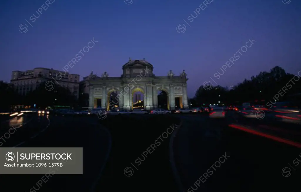 Archway lit up at night, Puerta de Alcala, Madrid, Spain