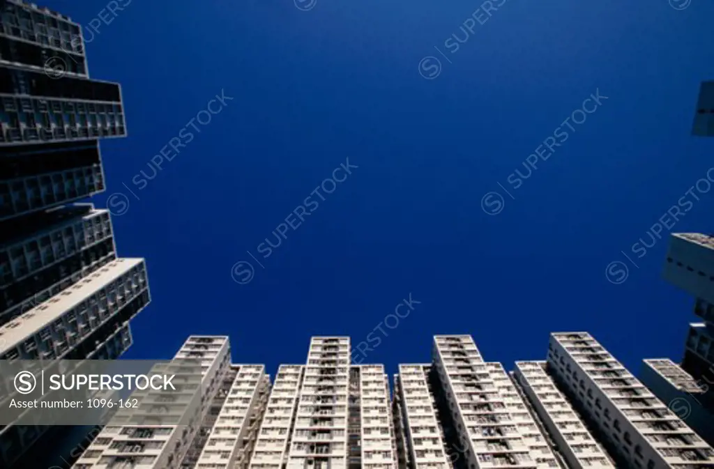 Low angle view of residential buildings, Hong Kong, China