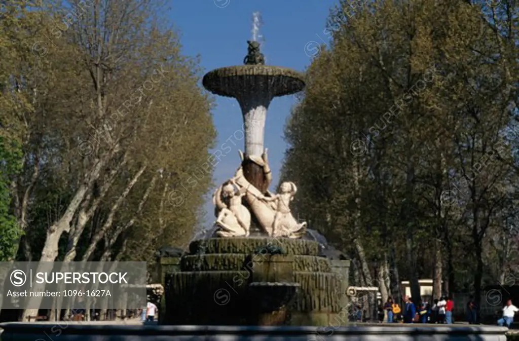Low angle view of a fountain in a park, Retiro Park, Madrid, Spain