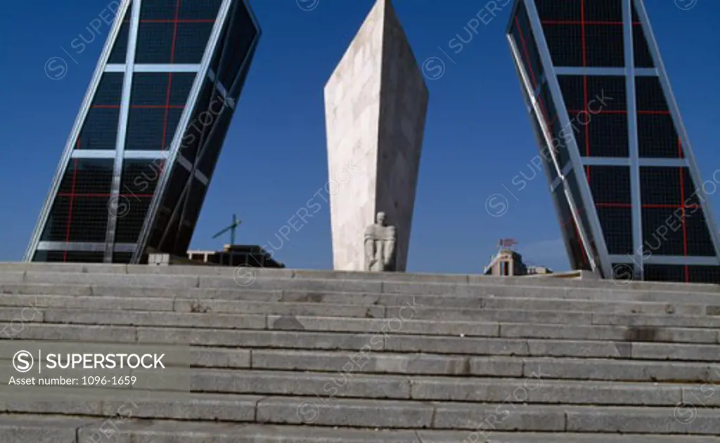 Low angle view of a monument between two towers, Puerta de Europa (Kio Towers), Madrid, Spain